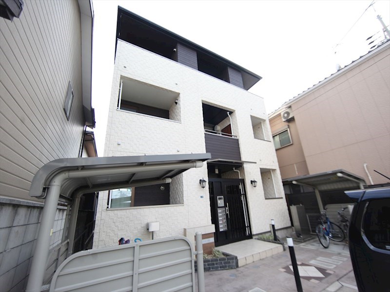 ラポール筒井 外観　オートロック付　屋根付き駐輪場有り　1フロア2部屋