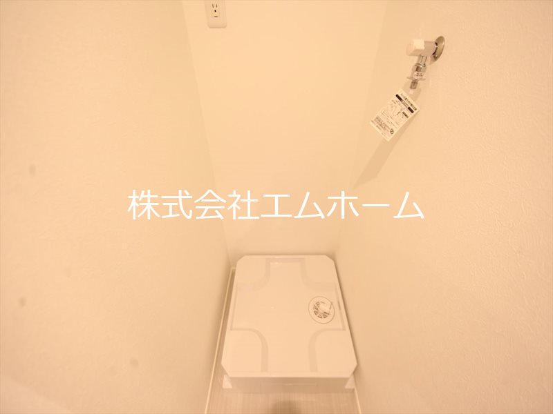ハーモニーテラス辰巳町 室内洗濯機置き場　同型写真