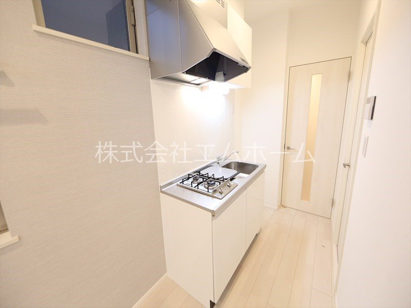 ハーモニーテラス木之免町 システムキッチン（ガス2口コンロ付）同型写真